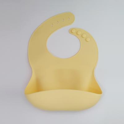 Cina Bib in silicone stampato su misura Cute Cartoon Design Food Catcher Bib in vendita