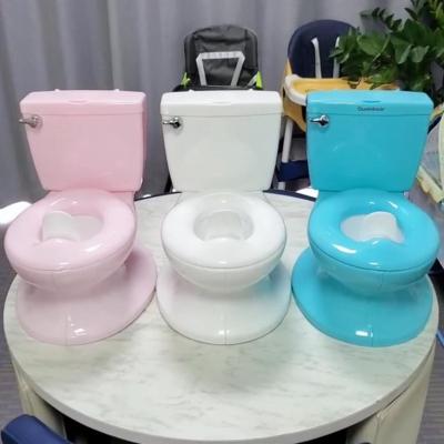 China PP Plastic Child'S Potty Training Seat Simulation Flushing Baby Potty Toilet for sale