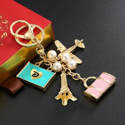 China Airplane Gold Eiffel Tower Bag China Fashion Travel Camera Key Chain Charms For Women Key Chains Handbag Key Rings for sale