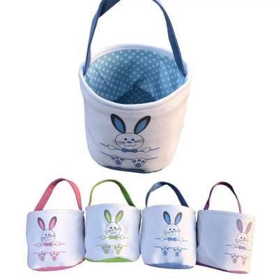 China 100pcs/ctn Bunny Face Printed Easter Bucket 2020 for Boy or Girl Easter Egg Hunt Canvas Bunny Basket with Handle for sale