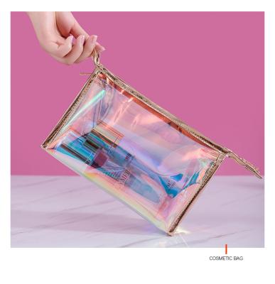 China Waterproof Storage Bag Make Up Bag Crystal Waterproof Candy Color Transparent TPU Holographic Laser Cosmetic Bag With Zipper for sale