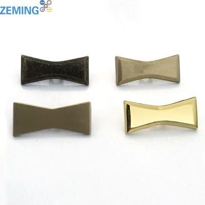 China Dry Cleaning Bowknot Form Zinc Alloy Sofa Headboard Button Decorative Buckle For Sale for sale