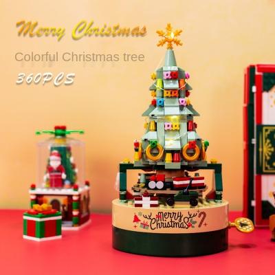 China DIY TOY Christmas Tree Building Blocks Music Box Christmas Rotating Puzzle Assembling Small Particle Block Toys Gift for sale