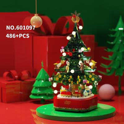 China DIY TOY Christmas Gift Music Christmas Tree Lights Rotating Box Assembling Santa Building Blocks Toys for sale