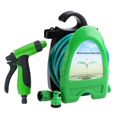 China Adjustable Garden Patio Hose Spray Gun Watering Set Kit On Reel With Connector for sale