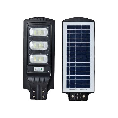 China Photosensitive Sensing + Human Body Sensing Warehouse Garden IP65 Outdoor Solar Street Light for sale