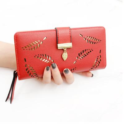 China 2021 new fashion leaf hollow out ladies wallet paragraph zipper buckle handbag along for sale