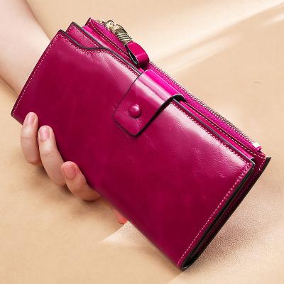 China Fashion Women Travel Purse Zipper Around Clutch Wallets RFID Wristband Blocking PU Leather Wallet Along for sale