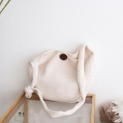 China Japanese woolen knitted senator literary woven Korean knitted bag autumn and winter solid color bag Amazon series fashion DOOR shoulder bag for sale