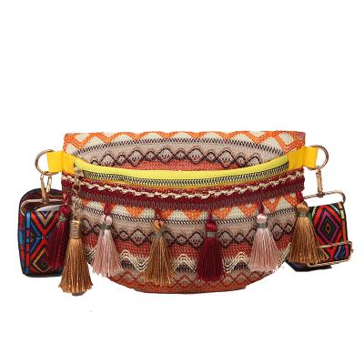 China BY THE DOOR 2021 fashion new and Korean tassel Japanese small shoulder woven messenger female ethnic wind bag single waist bag for sale