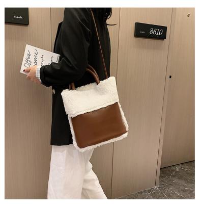 China 2021 Japan and Korea new lambskin lady bag small bucket hair phone bag fashion all-match single shoulder color messenger bag for sale