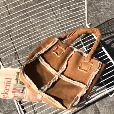 China Women's fashion bags 2021 new autumn and winter INS lamb hair girl fashion large-capacity messenger wild simple handbag for sale