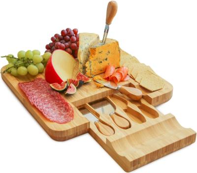 China Sustainable Whole Panel 4 Cheese Bamboo Cutting Board Square Durable Stainless Steel Cutting Knives for sale