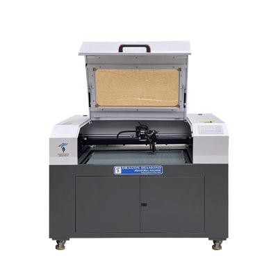 China Hotels UCO 6090 Automatic CO2 Laser Cutting Machine 60w 80w 100w Position With CCD Camera Supply High Quality Manufacturer for sale