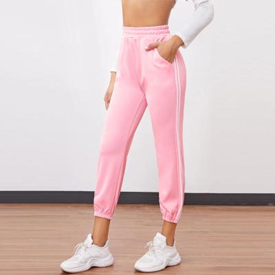 China Anti-wrinkle fashion girls sweatpants pink sports pants lace up striped side pockets trousers for women for sale