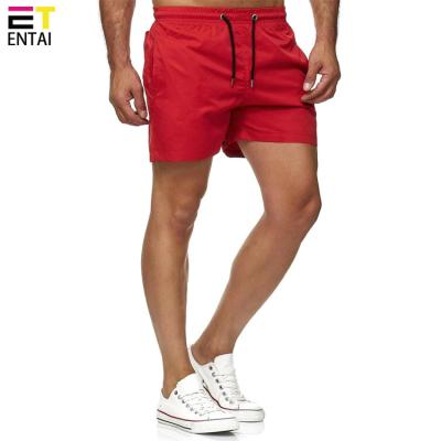 China Logo Pocket Track Shorts In Red Gym Swim Men Fitness Sports Training Running Shorts Customized byride for sale