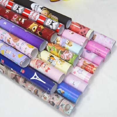 China Custom Logo Flower Wrapping Paper 80gsm Anti-Curl Waterproof Christmas Gift Wrapping Paper for sale