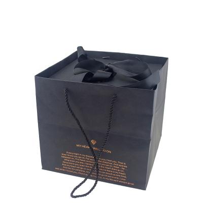 China FSC Biodegradable Special Design Printing Custom Logo Flower Packaging Ribbon Closure Hot Stamping Black Gift Box With Paper Handbag for sale