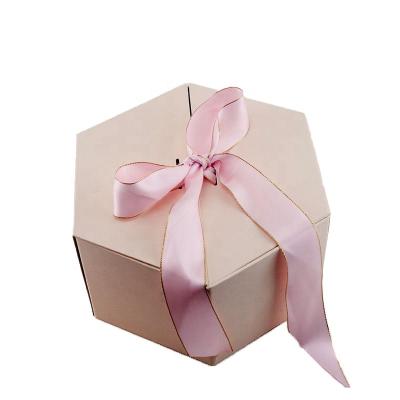 China Beautiful Eco-friendly Cajas De Regalo Custom Recyclable Regular Hexagon Rose Flower Packaging Gift Box With Border Gold Ribbon for sale