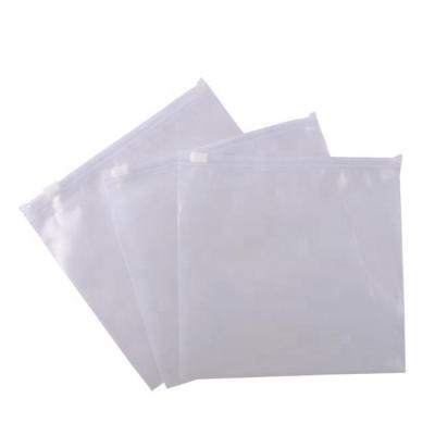 China Recyclable Clear PE Material Slider Zip On Cloth Top Seal Bag for sale