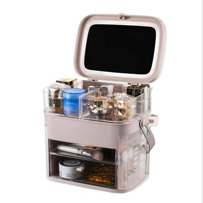 China Viable New Design Custom Tik Tok Fashion Girls Logo Table Organizer Jewelery Led Light Cosmetic Storage Box With Mirror for sale