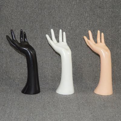 China Stand Jewelry Rings Plastic Wristwatch Display Mannequin Hand Realistic Skin Color Mannequin Hand For Sale for sale