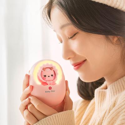 China Fastest Support Charging Support Sales Eggshell USB Portable Electric Power Bank Rechargeable Hand Warmer with Led Light 6000 mAh for sale