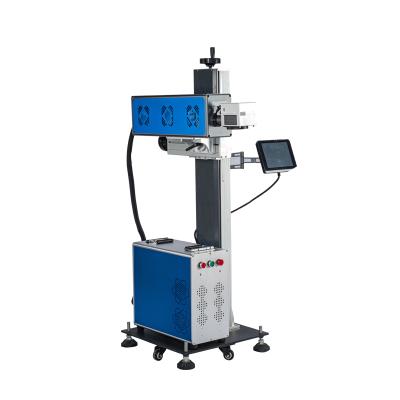 China Laser Marking Flying 20w 30w Laser CO2 Laser Marking Machine For Wood Plastic Leather for sale