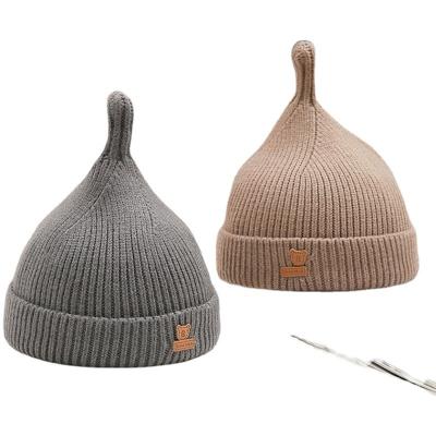 China Casual baby hat autumn and winter protecting pure color simple children's hat woolen warm knitted newborn hat for sale