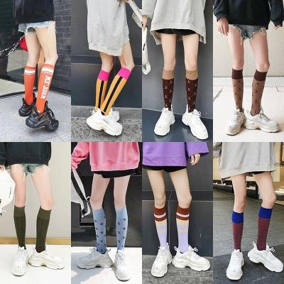 China Viable fashion celebrity calfskin line socks mix colors contrast color bird lattice fashio tube bottom socks women knee-high high for sale