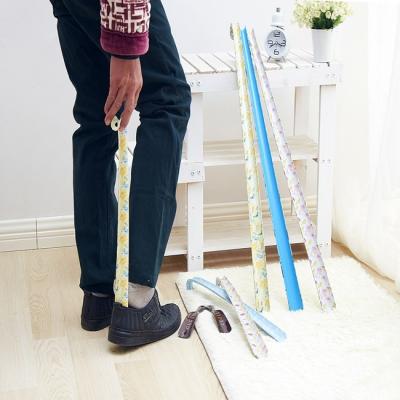 China Plastic Hign Quality Long Handled Shoe Horn For Hotel Promotion Shoe Pusher for sale