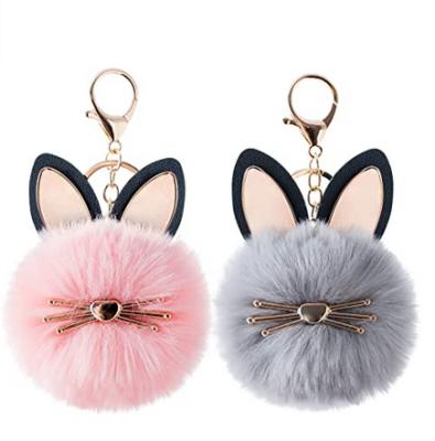 China Puff Ball Style 2Pcs Pom Pom Fluffy Cute Cat Keychain Key Chain For Women Bag Purse Car Key Rings Party Use for sale