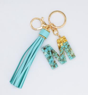 China New Style Tassel English Alphabet Key Chain Fashion Bag Pendant Single Letter Key Chain Jewelry Female for sale