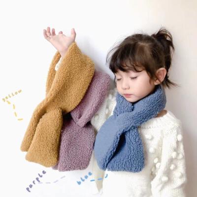 China New Korean autumn and winter children's long scarf berber fleece plush baby scares cute cross cute warm children's scarf for sale