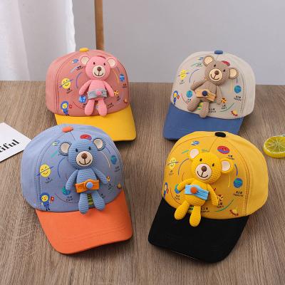 China Korean foreign thin tide dome style baby hat spring shade and autumn baseball cap boys and girls children's hats detachable doll for sale