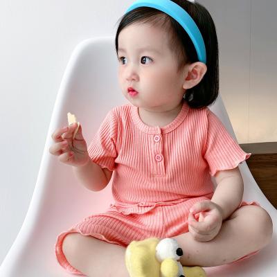 China Anti-wrinkle baby toddler pajamas in candy colors suit kids pajamas 2021 summer with short sleeves for sale