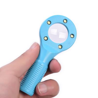 China Kids 3X LED Glass Colorful Handheld Magnifying Light with UV Light for Reading Pocket Magnifying Glass for sale