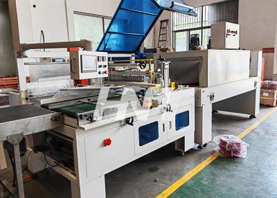 中国 Automatic Cable Coiling Strapping And Film Packing Line 販売のため