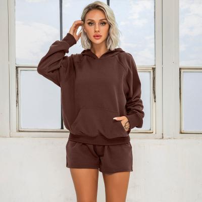 China QUICK DRY Front Pocket Long Sleeve Sweater Women's Winter Loose Hooded Pullover Sportswear Fitness Casual Gym Set Clothing for sale