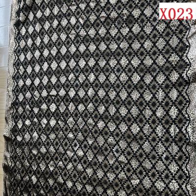 China 2022 new design sheer haydrotropic embroidery on print polyester spandex knitting fabric for dress for sale