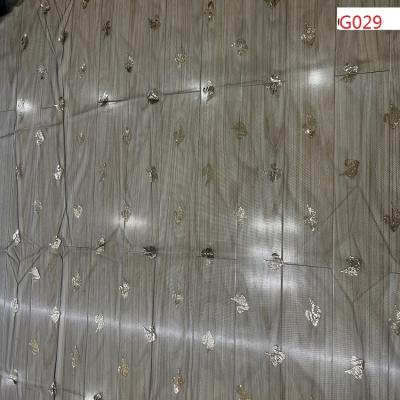 China Shrink-Resistant Glue Sequin On 100% Polyester Mesh For Woman And Girls Dress for sale