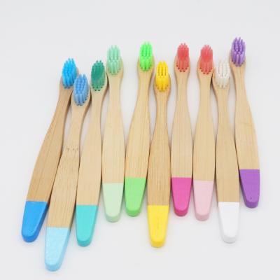 China Eco - Friendly Flat Handle Kid Bamboo Toothbrush With Different Color Painting Tip for sale