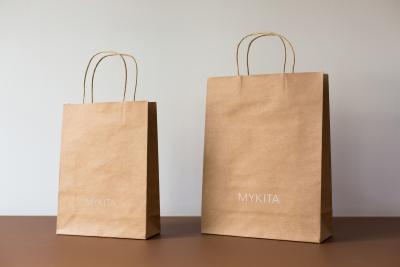 China Brown kraft paper bag wholesale food packing bag with handle for sale