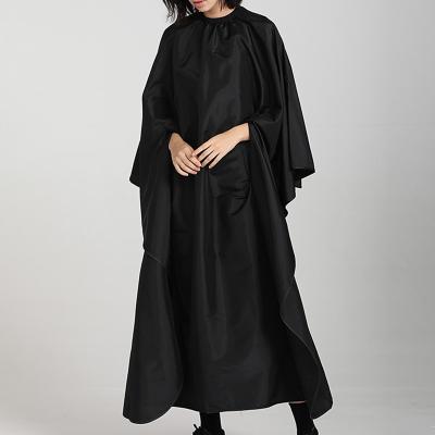 China MYGO Low Price Polyester Beauty Salon Black Waterproof Professional Black Bib Cape Adjustable Snap Neck Barber Cape for sale