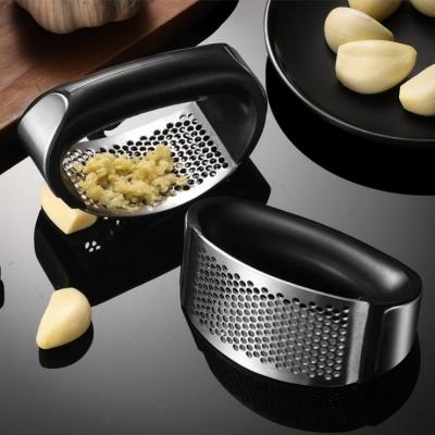 China MYGO Stainless Steel Garlic Press Crusher Crusher Crusher Kitchen Tool Kit Practical Manual Practical Garlic Pounder for sale