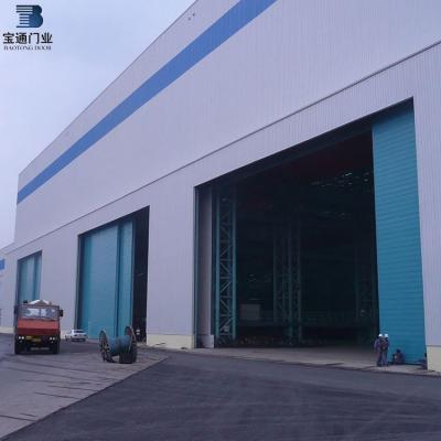 China Modern Automatic Industrial Warehouse Steel Overhead Double Door /sliding Sectional Door With Good Quality Motor for sale