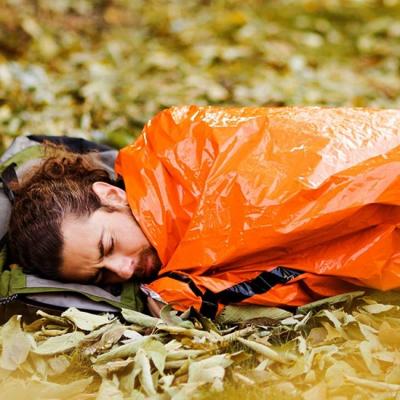 China Keep Warm In The Lightweight Waterproof Emergency Sleeping Bag Survival Sleeping Bag PE Aluminum Film Thermal Bivvy Bag For Outdoor Activities for sale