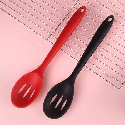 China Non Stick Cookware Sustainable Heat Resistant Mixing Silicone Slotted Serving Spoon for sale