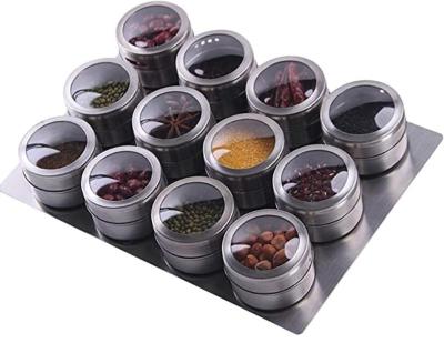 China Viable Hot Sale 12 Spice Jar Containers Magnetic Spice Tins Stainless Steel Wall Mounted Base Easy To Install Spice Rack Set for sale