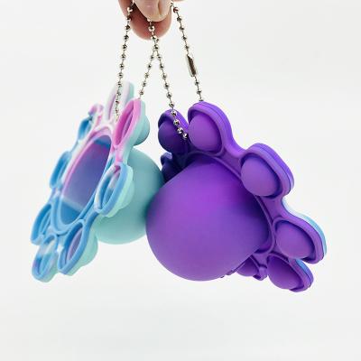 China Kids Learning 2021 Hot Sale Reverse Octopus Bubble Push Noise Key Key Chained Person Toys Gifts for Babies and Toddlers First Educational Keychain Toy for sale